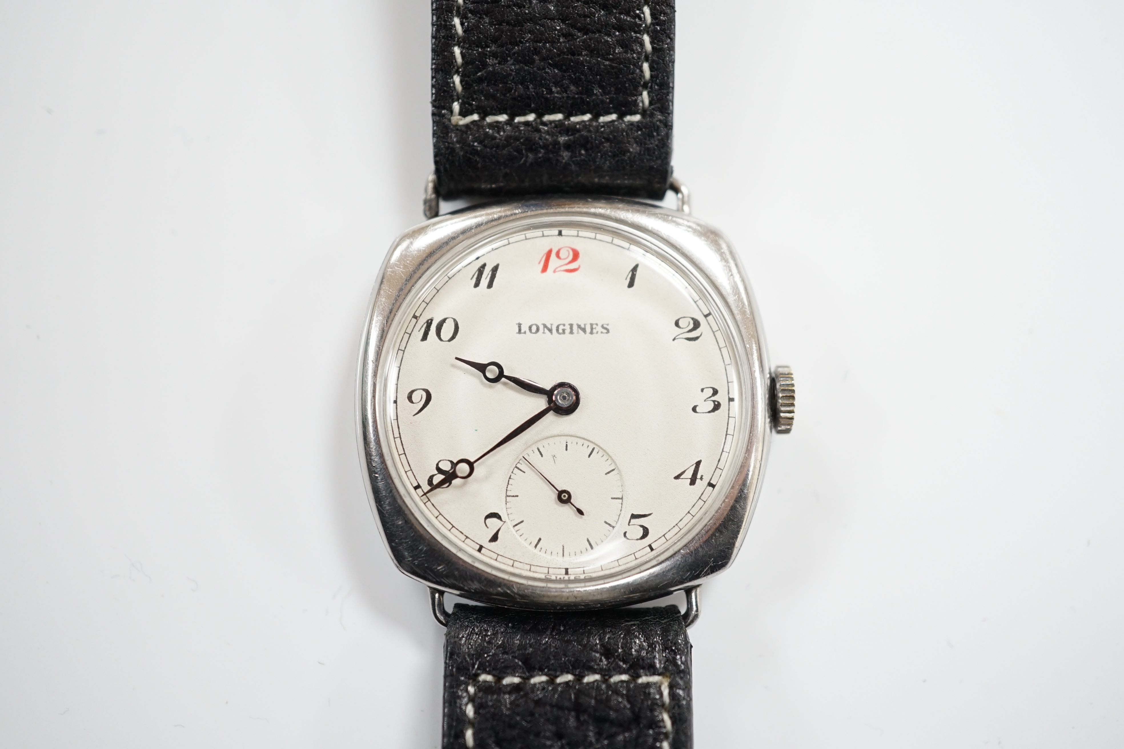 A gentleman's 1930's? stainless steel Longines manual wind wrist watch, with Arabic dial and subsidiary seconds, case diameter 32mm, on an associated leather strap.